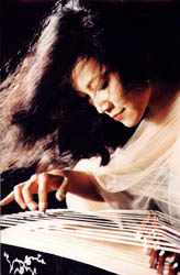 Mei Han Playing the zheng or guzheng